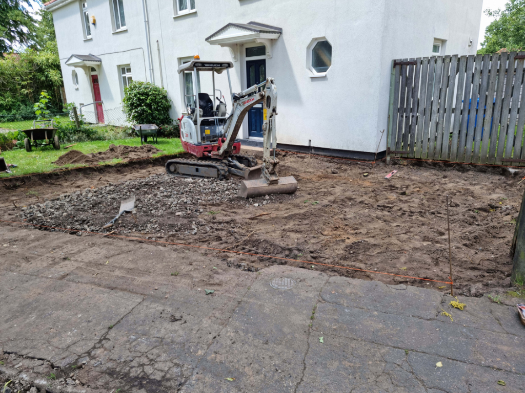 This is a photo of a dig out being carried out by Newmarket Driveway Surfacing in preparation for a block paving driveway