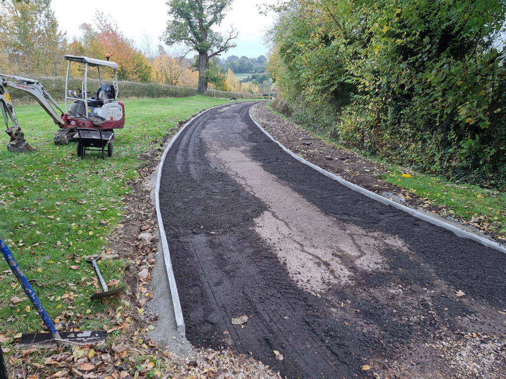 This is a large driveway which is in the process of having a tar and chip driveway installed on by Newmarket Driveway Surfacing