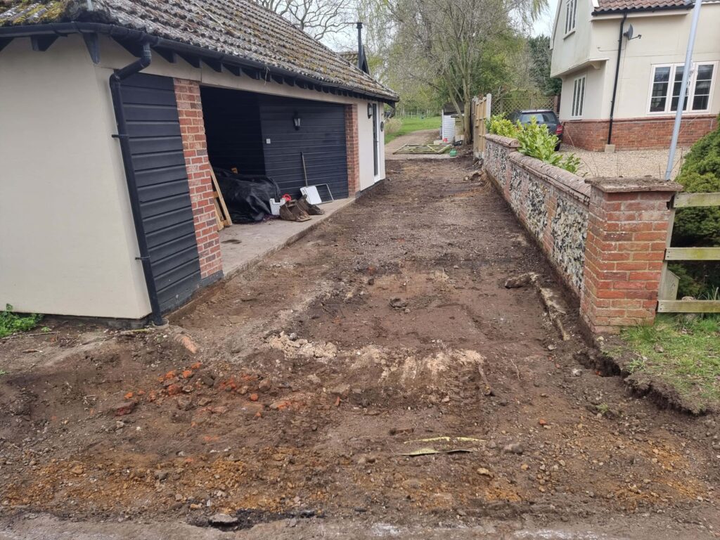 This is a tarmac driveway that is in the process of being dug out and installed by Newmarket Driveway Surfacing